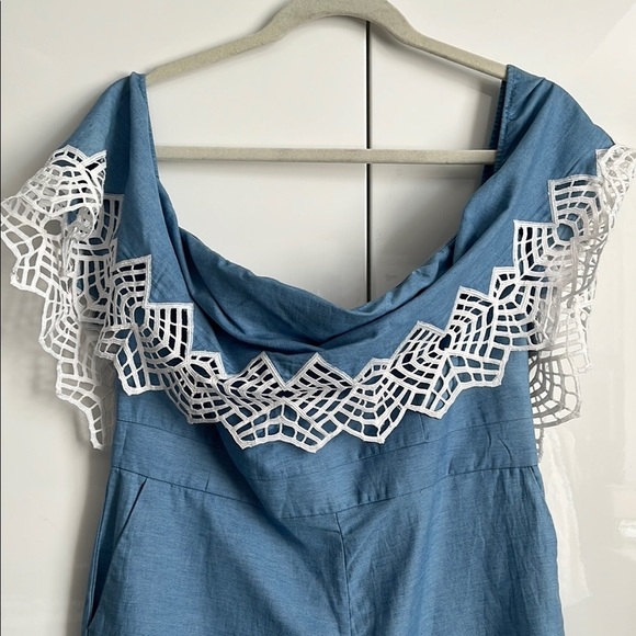 REVOLVE BARDOT Runaway Romper in Sky Blue Chambray with embroidered detail. - Picture 13 of 13